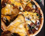 صورة لخطوة 3 من وصفة بيتزا المطاعم 🍕