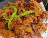 A picture of step 3 of Crispy onion pakoda / kurkuri kanda bhajji.