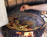 A picture of step 8 of Paella with Vegetables and Meat.