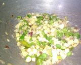 A picture of step 2 of Veg kathi roll with yoghurt mint chutney.