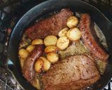 A picture of step 4 of Sirloin Steaks with fried baby potatoes & a greek salad.