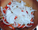 Foto del paso 3 de la receta: Filetillos de contramuslos de pollo al Sindhi biryani