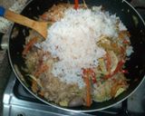Foto del paso 2 de la receta: Arroz de molleja y corazón de pollo.