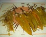 A picture of step 6 of Long Green Peppers Stuffed with Meat and Sauce.