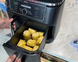 A picture of step 2 of Air fryer corn on the cob.