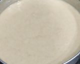 A picture of step 3 of Eggless Whole wheat Vanilla cake with white chocolate ganache.