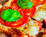 A picture of step 6 of Quick Caprese Puff Pastry Pizza with Basil Pesto by TastyPinch.