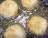 A picture of step 3 of Angel hair pasta coated fish balls.