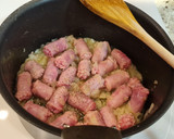 Foto del paso 2 de la receta: Salchichas guisadas con patatas y calabaza al tandoori masala