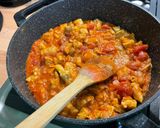 A picture of step 15 of Chicken Curry with Chickpeas, Eggplant, and Spinach.
