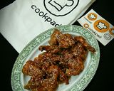A picture of step 7 of Spicy wings with sauce.