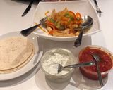 A picture of step 4 of Paprika chicken fajitas.
