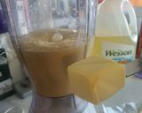A picture of step 2 of Orange Cup Cakes 🍊 with chocolate chip.