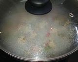 A picture of step 9 of Stuffed clams gravy.