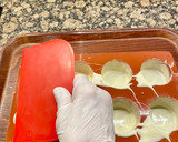Foto del paso 8 de la receta: Tartitas de chocolate “negro y blanco”, rellenas con crema de nueces