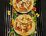 A picture of step 4 of Cheesy Bread Disc Tawa Pizza.