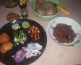 A picture of step 1 of Kibda (Egyptian liver sauce) and French fries.