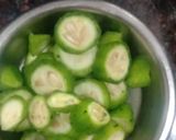 A picture of step 1 of Onion and bitter gourd karela sabji.