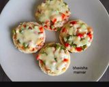 A picture of step 5 of Mini bread pizza.