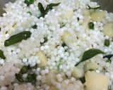 A picture of step 3 of Sabudana with green matar.