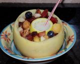 Foto del paso 5 de la receta: Melón con ensalada de frutas y centro de piña colada