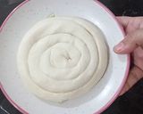 A picture of step 4 of Rope Style Paratha Folding.