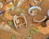 Foto del paso 9 de la receta: Estofado de alcachofas, almejas y langostinos