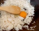 A picture of step 2 of My Egg fried Rice with the malaysian curry sauce.