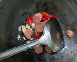 Foto langkah ke 4 dari resep Oseng Kembang Kol dan Sosis.