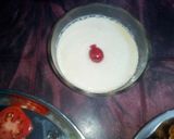A picture of step 37 of Aloo fulcopi katla rosha ar misti doi.