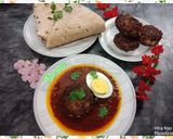 A picture of step 6 of Koftay aloo ka salan.