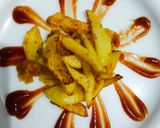 A picture of step 4 of Masala French fries.