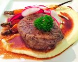 A picture of step 16 of Fillet of beef with parsnip and macadamia purée with seasonal vegetables.