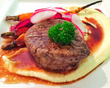 A picture of step 16 of Fillet of beef with parsnip and macadamia purée with seasonal vegetables.