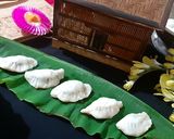 A picture of step 12 of Assamese Mohura Pitha.