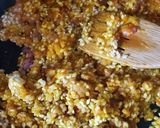A picture of step 4 of Bajoques Farcides Agres (Stuffed Peppers with Rice and Sausage).