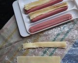 Foto del paso 2 de la receta: Salchichas con queso sobre arroz integral