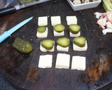 Foto del paso 6 de la receta: Triángulos de salmón con banderillas