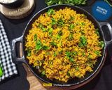 A picture of step 7 of Maharashtrian Phodnicha Masala Bhat.
