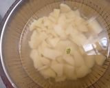 A picture of step 3 of Tindora (little gourd) with potato and tomato.
