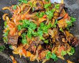 A picture of step 8 of Pyaazi karela (bittergourd in onion masala).