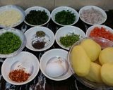 A picture of step 1 of Kache Aloo ke Kebab.