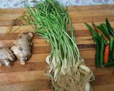 A picture of step 1 of Green garlic, green chilli ginger pickle.