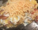 A picture of step 2 of Closest thing to an Omelette Sandwich as I will make.