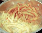 A picture of step 3 of Masala French fries.