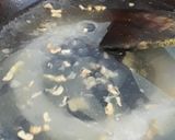 A picture of step 1 of Garlic rice balls and baked beans.