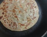 A picture of step 5 of Potato paratha with onion raita.