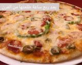 صورة لخطوة 7 من وصفة بيتزا 🍕