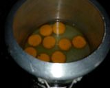 A picture of step 1 of Orange rasmalai.