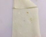A picture of step 2 of Qeemay k Samosay (How to wrap samosa step by step).